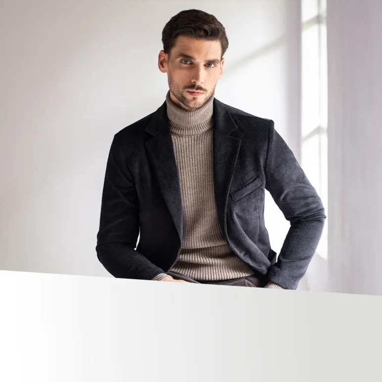 mężczyzna w czarnej kurtce